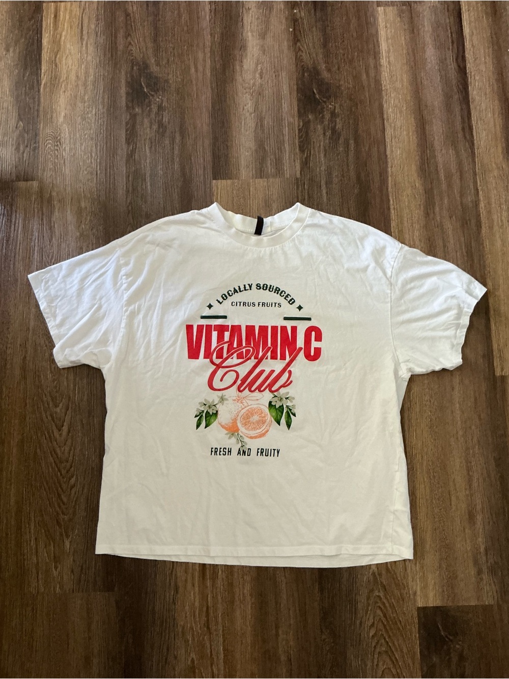 Divided White Graphic Tee with Red 'Vitamin C Club' Print